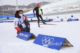 12.02.2022, Beijing, China (CHN): Event Feature: Volunteer prepares the v-boards - XXIV. Olympic Winter Games Beijing 2022, Biathlon, training, Beijing (CHN). www.nordicfocus.com. © Manzoni/NordicFocus. Every downloaded picture is fee-liable.