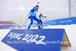 17.02.2022, Beijing, China (CHN): Emilien Jacquelin (FRA), Quentin Fillon Maillet (FRA), (l-r) - XXIV. Olympic Winter Games Beijing 2022, Biathlon, training, Beijing (CHN). www.nordicfocus.com. © Manzoni/NordicFocus. Every downloaded picture is fee-liable.