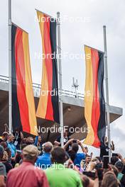 27.08.2022, Ruhpolding, Germany (GER): Event Feature: German flags - IBU Summer Biathlon World Championships, sprint junior women, Ruhpolding (GER). www.nordicfocus.com. © Manzoni/NordicFocus. Every downloaded picture is fee-liable.