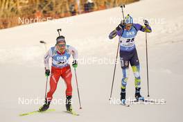 17.12.2022, Annecy-Le Grand Bornand, France (FRA): Joscha Burkhalter (SUI), Anton Dudchenko (UKR), (l-r) -  IBU World Cup Biathlon, pursuit men, Annecy-Le Grand Bornand (FRA). www.nordicfocus.com. © Thibaut/NordicFocus. Every downloaded picture is fee-liable.