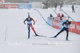 15.12.2022, Annecy-Le Grand Bornand, France (FRA): Eric Perrot (FRA), Tomas Kaukenas (LTU), (l-r) -  IBU World Cup Biathlon, sprint men, Annecy-Le Grand Bornand (FRA). www.nordicfocus.com. © Authamayou/NordicFocus. Every downloaded picture is fee-liable.