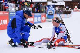 16.12.2022, Annecy-Le Grand Bornand, France (FRA): Janis Berzins  (LAT), Amy Baserga (SUI), (l-r) -  IBU World Cup Biathlon, sprint women, Annecy-Le Grand Bornand (FRA). www.nordicfocus.com. © Manzoni/NordicFocus. Every downloaded picture is fee-liable.