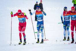 03.01.2022, Val di Fiemme, Italy (ITA): Alexey Chervotkin (RUS), Iivo Niskanen (FIN), (l-r)  - FIS world cup cross-country, tour de ski, mass men, Val di Fiemme (ITA). www.nordicfocus.com. © Modica/NordicFocus. Every downloaded picture is fee-liable.