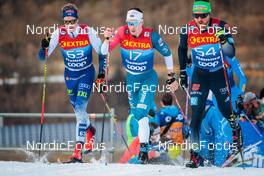 03.01.2022, Val di Fiemme, Italy (ITA): Ville Ahonen (FIN), Andrew Musgrave (GBR), Thomas Bing (GER), (l-r)  - FIS world cup cross-country, tour de ski, mass men, Val di Fiemme (ITA). www.nordicfocus.com. © Modica/NordicFocus. Every downloaded picture is fee-liable.