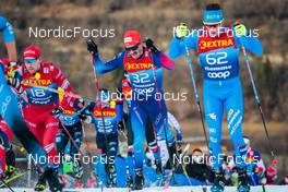03.01.2022, Val di Fiemme, Italy (ITA): Ilia Semikov (RUS), Jonas Baumann (SUI), Maicol Rastelli (ITA), (l-r)  - FIS world cup cross-country, tour de ski, mass men, Val di Fiemme (ITA). www.nordicfocus.com. © Modica/NordicFocus. Every downloaded picture is fee-liable.