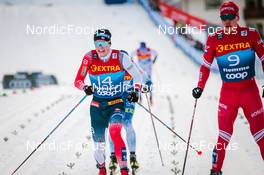 03.01.2022, Val di Fiemme, Italy (ITA): Harald Oestberg Amundsen (NOR), Ivan Yakimushkin (RUS), (l-r)  - FIS world cup cross-country, tour de ski, mass men, Val di Fiemme (ITA). www.nordicfocus.com. © Modica/NordicFocus. Every downloaded picture is fee-liable.