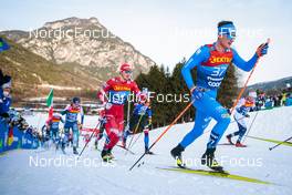 03.01.2022, Val di Fiemme, Italy (ITA): Gleb Retivykh (RUS), Giandomenico Salvadori (ITA), (l-r)  - FIS world cup cross-country, tour de ski, mass men, Val di Fiemme (ITA). www.nordicfocus.com. © Modica/NordicFocus. Every downloaded picture is fee-liable.