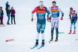 03.01.2022, Val di Fiemme, Italy (ITA): Andrew Musgrave (GBR), Gustav Eriksson (SWE), (l-r)  - FIS world cup cross-country, tour de ski, mass men, Val di Fiemme (ITA). www.nordicfocus.com. © Modica/NordicFocus. Every downloaded picture is fee-liable.