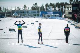 13.03.2022, Falun, Sweden (SWE): Zak Ketterson (USA), Scott Patterson (USA), Rosie Brennan (USA), (l-r)  - FIS world cup cross-country, mixed relay, Falun (SWE). www.nordicfocus.com. © Modica/NordicFocus. Every downloaded picture is fee-liable.