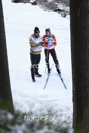 08.11.2022, Davos, Switzerland (SUI): Ivan Hudac, Coach Team Switzerland, Alina Meier (SUI), (l-r) - Cross-Country training, Snowfarming track, Davos (SUI). www.nordicfocus.com. © Manzoni/NordicFocus. Every downloaded picture is fee-liable.