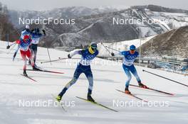 19.02.2022, Beijing, China (CHN): Jules Lapierre (FRA), Dario Cologna (SUI), (l-r)  - XXIV. Olympic Winter Games Beijing 2022, cross-country, mass men, Beijing (CHN). www.nordicfocus.com. © Thibaut/NordicFocus. Every downloaded picture is fee-liable.