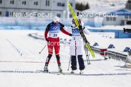 20.02.2022, Beijing, China (CHN): Therese Johaug (NOR), Dinigeer Yilamujiang (CHN), (l-r)  - XXIV. Olympic Winter Games Beijing 2022, cross-country, mass women, Beijing (CHN). www.nordicfocus.com. © Modica/NordicFocus. Every downloaded picture is fee-liable.