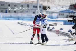 20.02.2022, Beijing, China (CHN): Therese Johaug (NOR), Dinigeer Yilamujiang (CHN), (l-r)  - XXIV. Olympic Winter Games Beijing 2022, cross-country, mass women, Beijing (CHN). www.nordicfocus.com. © Modica/NordicFocus. Every downloaded picture is fee-liable.