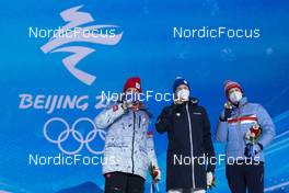 11.02.2022, Beijing, China (CHN): Alexander Bolshunov (ROC), Iivo Niskanen (FIN), Johannes Hoesflot Klaebo (NOR), (l-r) - XXIV. Olympic Winter Games Beijing 2022, cross-country, medals, Beijing (CHN). www.nordicfocus.com. © Thibaut/NordicFocus. Every downloaded picture is fee-liable.