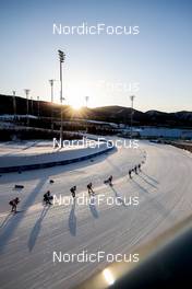 16.02.2022, Beijing, China (CHN): Competitors sorrounded by the colors of the sunset   - XXIV. Olympic Winter Games Beijing 2022, cross-country, team sprint, Beijing (CHN). www.nordicfocus.com. © Modica/NordicFocus. Every downloaded picture is fee-liable.