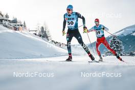 18.12.2022, Davos, Switzerland (SUI): Lucas Boegl (GER), Beda Klee (SUI), (l-r)  - FIS world cup cross-country, 20km, Davos (SUI). www.nordicfocus.com. © Modica/NordicFocus. Every downloaded picture is fee-liable.