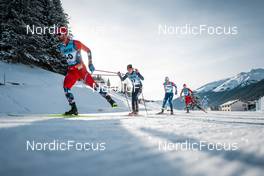 18.12.2022, Davos, Switzerland (SUI): Hans Christer Holund (NOR), Gus Schumacher (USA), Andrew Young (GBR), Simen Hegstad Krueger (NOR), (l-r)  - FIS world cup cross-country, 20km, Davos (SUI). www.nordicfocus.com. © Modica/NordicFocus. Every downloaded picture is fee-liable.