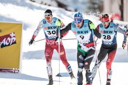 17.12.2022, Davos, Switzerland (SUI): Benjamin Moser (AUT), Antoine Cyr (CAN), (l-r)  - FIS world cup cross-country, individual sprint, Davos (SUI). www.nordicfocus.com. © Modica/NordicFocus. Every downloaded picture is fee-liable.