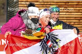 08.01.2022, Val di Fiemme, Italy (ITA): Johannes Lamparter (AUT) celebrating with his parents after his first ever world cup victory - FIS world cup nordic combined men, individual gundersen HS106/10km, Val di Fiemme (ITA). www.nordicfocus.com. © Volk/NordicFocus. Every downloaded picture is fee-liable.