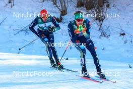 08.01.2022, Val di Fiemme, Italy (ITA): Johannes Rydzek (GER), Fabian Riessle (GER), (l-r)  - FIS world cup nordic combined men, individual gundersen HS106/10km, Val di Fiemme (ITA). www.nordicfocus.com. © Volk/NordicFocus. Every downloaded picture is fee-liable.