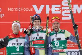 09.01.2022, Val di Fiemme, Italy (ITA): Johannes Lamparter (AUT), Vinzenz Geiger (GER), Johannes Rydzek (GER), (l-r) - FIS world cup nordic combined men, individual gundersen HS106/10km, Val di Fiemme (ITA). www.nordicfocus.com. © Volk/NordicFocus. Every downloaded picture is fee-liable.