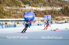 07.01.2022, Val di Fiemme, Italy (ITA): Taylor Fletcher (USA), Samir Mastiev (RUS), (l-r)  - FIS world cup nordic combined men, mixed team HS106, Val di Fiemme (ITA). www.nordicfocus.com. © Volk/NordicFocus. Every downloaded picture is fee-liable.