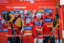 07.01.2022, Val di Fiemme, Italy (ITA): Joergen Graabak (NOR), Gyda Westvold Hansen (NOR), Mari Leinan Lund (NOR), Jens Luraas Oftebro (NOR), (l-r) - FIS world cup nordic combined men, mixed team HS106, Val di Fiemme (ITA). www.nordicfocus.com. © Volk/NordicFocus. Every downloaded picture is fee-liable.