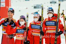 07.01.2022, Val di Fiemme, Italy (ITA): Joergen Graabak (NOR), Gyda Westvold Hansen (NOR), Mari Leinand Lund (NOR), Jens Luraas Oftebro (NOR), (l-r)  - FIS world cup nordic combined, mixed team HS106, Val di Fiemme (ITA). www.nordicfocus.com. © Volk/NordicFocus. Every downloaded picture is fee-liable.