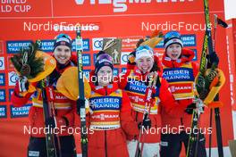 07.01.2022, Val di Fiemme, Italy (ITA): Joergen Graabak (NOR), Gyda Westvold Hansen (NOR), Mari Leinan Lund (NOR), Jens Luraas Oftebro (NOR), (l-r) - FIS world cup nordic combined men, mixed team HS106, Val di Fiemme (ITA). www.nordicfocus.com. © Volk/NordicFocus. Every downloaded picture is fee-liable.