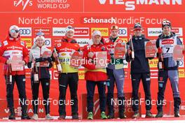 12.03.2022, Schonach, Germany (GER): Thomas Kjelbotn, Gyda Westvold Hansen (NOR), Clemens Derganc, Ivar Stuan, Julian Schmid (GER), Jarl Magnus Riiber (NOR), Terence Weber (GER), (l-r) Winners Nordic Combined Awards of the Year - FIS world cup nordic combined men, individual gundersen HS100/10km, Schonach (GER). www.nordicfocus.com. © Volk/NordicFocus. Every downloaded picture is fee-liable.