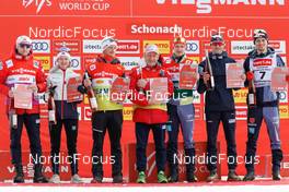 12.03.2022, Schonach, Germany (GER): Thomas Kjelbotn, Gyda Westvold Hansen (NOR), Clemens Derganc, Ivar Stuan, Julian Schmid (GER), Jarl Magnus Riiber (NOR), Terence Weber (GER), (l-r) Winners Nordic Combined Awards of the Year - FIS world cup nordic combined men, individual gundersen HS100/10km, Schonach (GER). www.nordicfocus.com. © Volk/NordicFocus. Every downloaded picture is fee-liable.