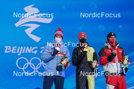 10.02.2022, Beijing, China (CHN): Joergen Graabak (NOR), Vinzenz Geiger (GER), Lukas Greiderer (AUT), (l-r) - XXIV. Olympic Winter Games Beijing 2022, nordic combined men, medals, Beijing (CHN). www.nordicfocus.com. © Thibaut/NordicFocus. Every downloaded picture is fee-liable.