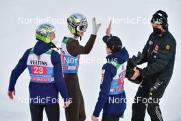 01.01.2022, Garmisch, Germany (GER): (l-r), Anze Lanisek (SLO), Lovro Kos (SLO), Cene Prevc (SLO) - FIS world cup ski jumping men, four hills tournament, individual HS142, Garmisch (GER). www.nordicfocus.com. © Reichert/NordicFocus. Every downloaded picture is fee-liable.