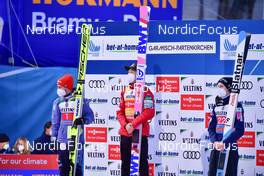 01.01.2022, Garmisch, Germany (GER): (l-r), Markus Eisenbichler (GER), Ryoyu Kobayashi (JPN), Lovro Kos (SLO) - FIS world cup ski jumping men, four hills tournament, individual HS142, Garmisch (GER). www.nordicfocus.com. © Reichert/NordicFocus. Every downloaded picture is fee-liable.