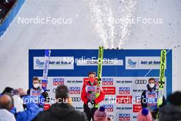 06.01.2022, Bischofshofen, Austria (AUT): (l-r), Halvor Egner Granerud (NOR), Daniel Huber (AUT), Karl Geiger (GER) - FIS world cup ski jumping men, four hills tournament, individual HS142, Bischofshofen (AUT). www.nordicfocus.com. © Reichert/NordicFocus. Every downloaded picture is fee-liable.