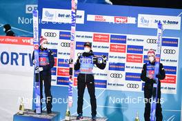 05.01.2022, Bischofshofen, Austria (AUT): (l-r), Marius Lindvik (NOR), Ryoyu Kobayashi (JPN), Halvor Egner Granerud (NOR) - FIS world cup ski jumping men, four hills tournament, individual HS142, Bischofshofen (AUT). www.nordicfocus.com. © Reichert/NordicFocus. Every downloaded picture is fee-liable.