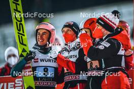 26.02.2022, Lahti, Finland (FIN): Stefan Kraft (AUT), Jan Hoerl (AUT), Ulrich Wohlgenannt (AUT), (l-r)  - FIS world cup ski jumping men, team HS130, Lahti (FIN). www.nordicfocus.com. © Thibaut/NordicFocus. Every downloaded picture is fee-liable.
