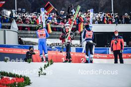 19.03.2022, Oberstdorf, Germany (GER): Timi Zajc (SLO), Stefan Kraft (AUT), Ziga Jelar (SLO), (l-r) - FIS world cup ski flying men, individual HS235, Oberstdorf (GER). www.nordicfocus.com. © Reichert/NordicFocus. Every downloaded picture is fee-liable
