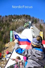 24.03.2022, Planica, Slovenia (SLO): feature: slovenian flag, kid - FIS world cup ski jumping men, training, Planica (SLO). www.nordicfocus.com. © Reichert/NordicFocus. Every downloaded picture is fee-liable.