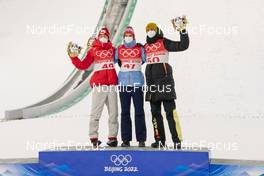 12.02.2022, Beijing, China (CHN): Ryoyu Kobayashi (JPN), Marius Lindvik (NOR), Karl Geiger (GER), (l-r) - XXIV. Olympic Winter Games Beijing 2022, ski jumping men, individual HS140, Beijing (CHN). www.nordicfocus.com. © Thibaut/NordicFocus. Every downloaded picture is fee-liable.