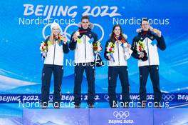 08.02.2022, Beijing, China (CHN): Nika Kriznar (SLO), Timi Zajc (SLO), Ursa Bogataj (SLO), Peter Prevc (SLO), (l-r) - XXIV. Olympic Winter Games Beijing 2022, ski jumping men and women, mixed team HS106, medals, Beijing (CHN). www.nordicfocus.com. © Thibaut/NordicFocus. Every downloaded picture is fee-liable.