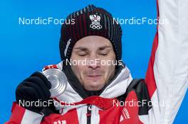 08.02.2022, Beijing, China (CHN): Manuel Fettner (AUT) - XXIV. Olympic Winter Games Beijing 2022, ski jumping men and women, mixed team HS106, medals, Beijing (CHN). www.nordicfocus.com. © Thibaut/NordicFocus. Every downloaded picture is fee-liable.