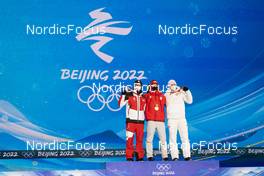 08.02.2022, Beijing, China (CHN): Manuel Fettner (AUT), Ryoyu Kobayashi (JPN), Dawid Kubacki (POL), (l-r) - XXIV. Olympic Winter Games Beijing 2022, ski jumping men, medals, Beijing (CHN). www.nordicfocus.com. © Thibaut/NordicFocus. Every downloaded picture is fee-liable.
