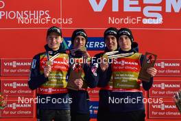13.03.2022, Vikersund, Norway (NOR): 1st place, Anze Lanisek (SLO), Peter Prevc (SLO), Timi Zajc (SLO), Domen Prevc (SLO), (l-r) - FIS world championships ski flying men, team HS240, Vikersund (NOR). www.nordicfocus.com. © Reichert/NordicFocus. Every downloaded picture is fee-liable.