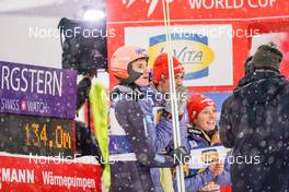 10.12.2022, Titisee-Neustadt, Germany (GER): Karl Geiger (GER), Constantin Schmid (GER), Katharina Althaus (GER), (l-r)  - FIS world cup ski jumping men, mixed team HS142, Titisee-Neustadt (GER). www.nordicfocus.com. © Thibaut/NordicFocus. Every downloaded picture is fee-liable.