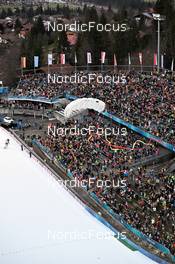 28.12.2022, Oberstdorf, Germany (GER): feature: skydiver - FIS world cup ski jumping men, four hills tournament, individual HS137, Oberstdorf (GER). www.nordicfocus.com. © Reichert/NordicFocus. Every downloaded picture is fee-liable.