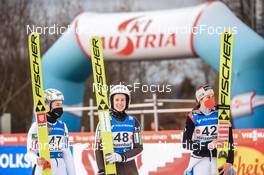 26.02.2022, Hinzenbach, Austria (AUT): Nika Kriznar (SLO), Ursa Bogataj (SLO), Lisa Eder (AUT) - FIS world cup ski jumping women, individual HS90, Hinzenbach (AUT). www.nordicfocus.com. © Tumashov/NordicFocus. Every downloaded picture is fee-liable.