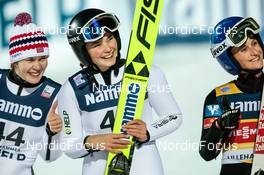 04.12.2022, Lillehammer, Norway (NOR): Anna Odine Stroem (NOR), Silje Opseth (NOR), Eva Pinkelnig (AUT), (l-r)  - FIS world cup ski jumping women, individual HS140, Lillehammer (NOR). www.nordicfocus.com. © Modica/NordicFocus. Every downloaded picture is fee-liable.