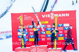 29.12.2022, Villach, Austria (AUT): Katharina Althaus (GER), Eva Pinkelnig (AUT), Nika Kriznar (SLO), (l-r), (l-r) - FIS world cup ski jumping women, individual HS98, Villach (AUT). www.nordicfocus.com. © Thibaut/NordicFocus. Every downloaded picture is fee-liable.