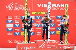 28.12.2022, Villach, Austria (AUT): Anna Odine Stroem (NOR), Eva Pinkelnig (AUT), Nika Kriznar (SLO), (l-r) - FIS world cup ski jumping women, individual HS98, Villach (AUT). www.nordicfocus.com. © Thibaut/NordicFocus. Every downloaded picture is fee-liable.